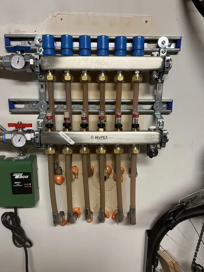 Plumber performing Gas Line Installation at a residential property in Mineola